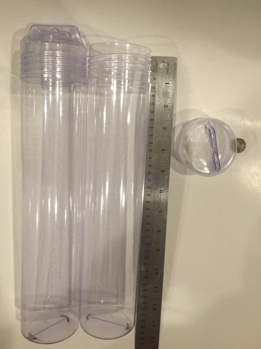 Six clear plastic tubes with hang caps displayed next to a ruler for scale.