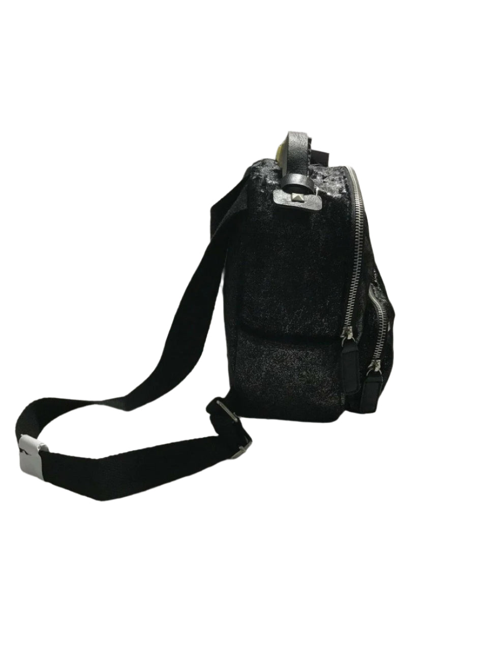Black faux fur mini backpack with silver tint and front zip pocket with metallic studs