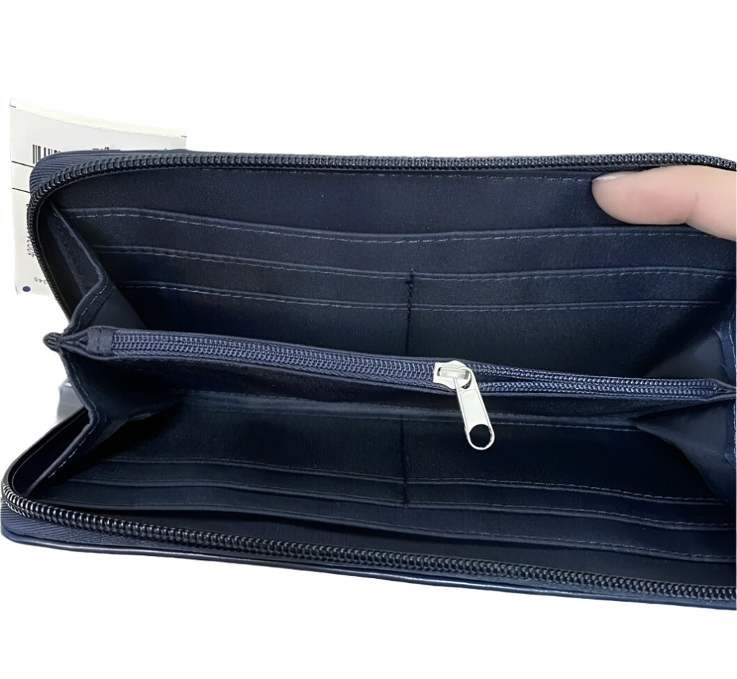 Tommy Hilfiger navy blue wallet with monogram print and silver logo plaque, shown with interior compartments.
