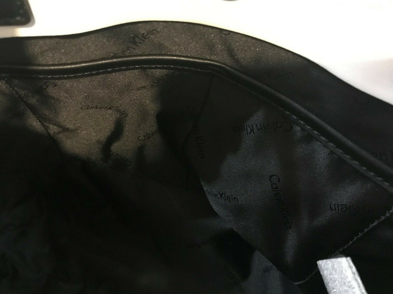 Calvin Klein Patty Faux Leather East / West Tote Fashion Bag Black White Travel
