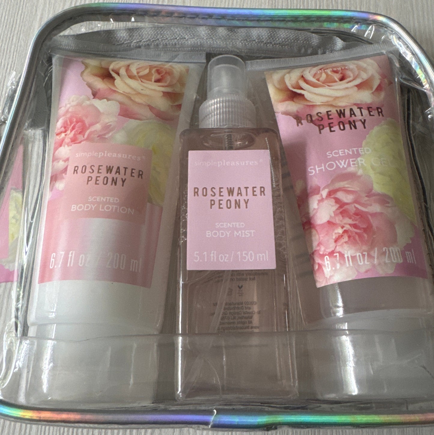 Simple Pleasures full-size rosewater peony body care set with lotion, mist, and shower gel in reusable zip pouch