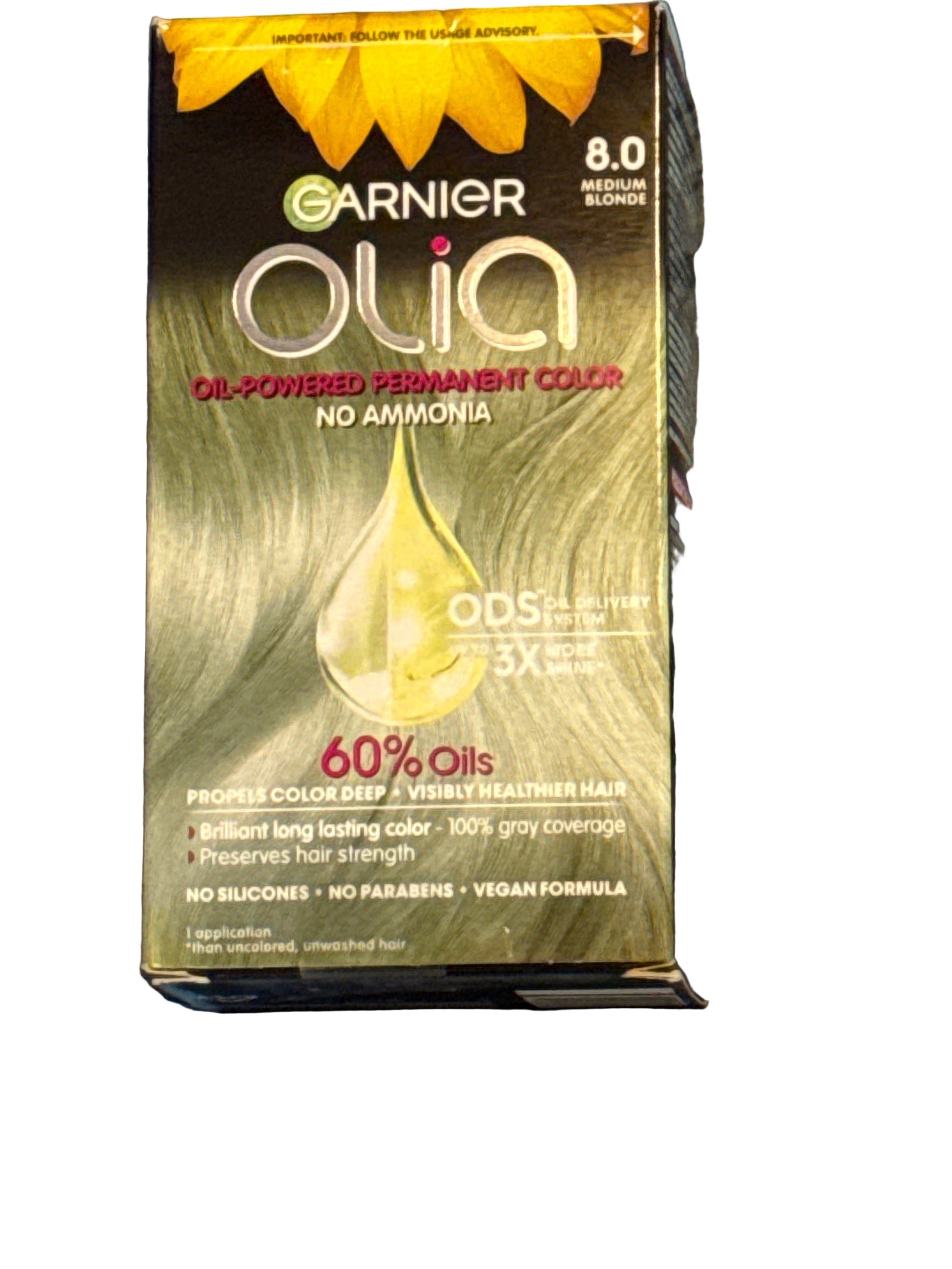 Front of Garnier Olia hair color box showing shade 8.0 Medium Blonde
Back of hair color box with instructions and ingredient information
Side view of Garnier Olia packaging displaying oil-powered color branding