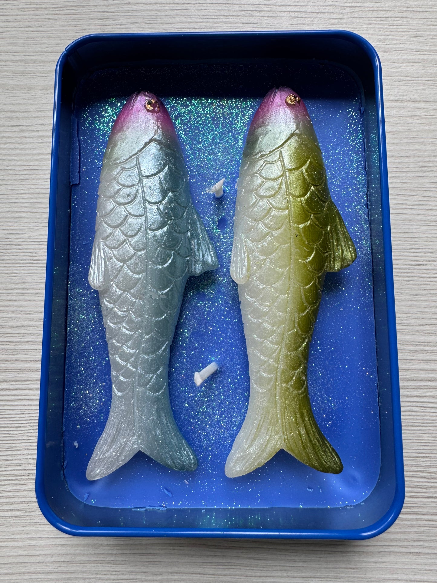 Coastal sardine tin with two colorful fish-shaped Mediterranean olive oil scented candles