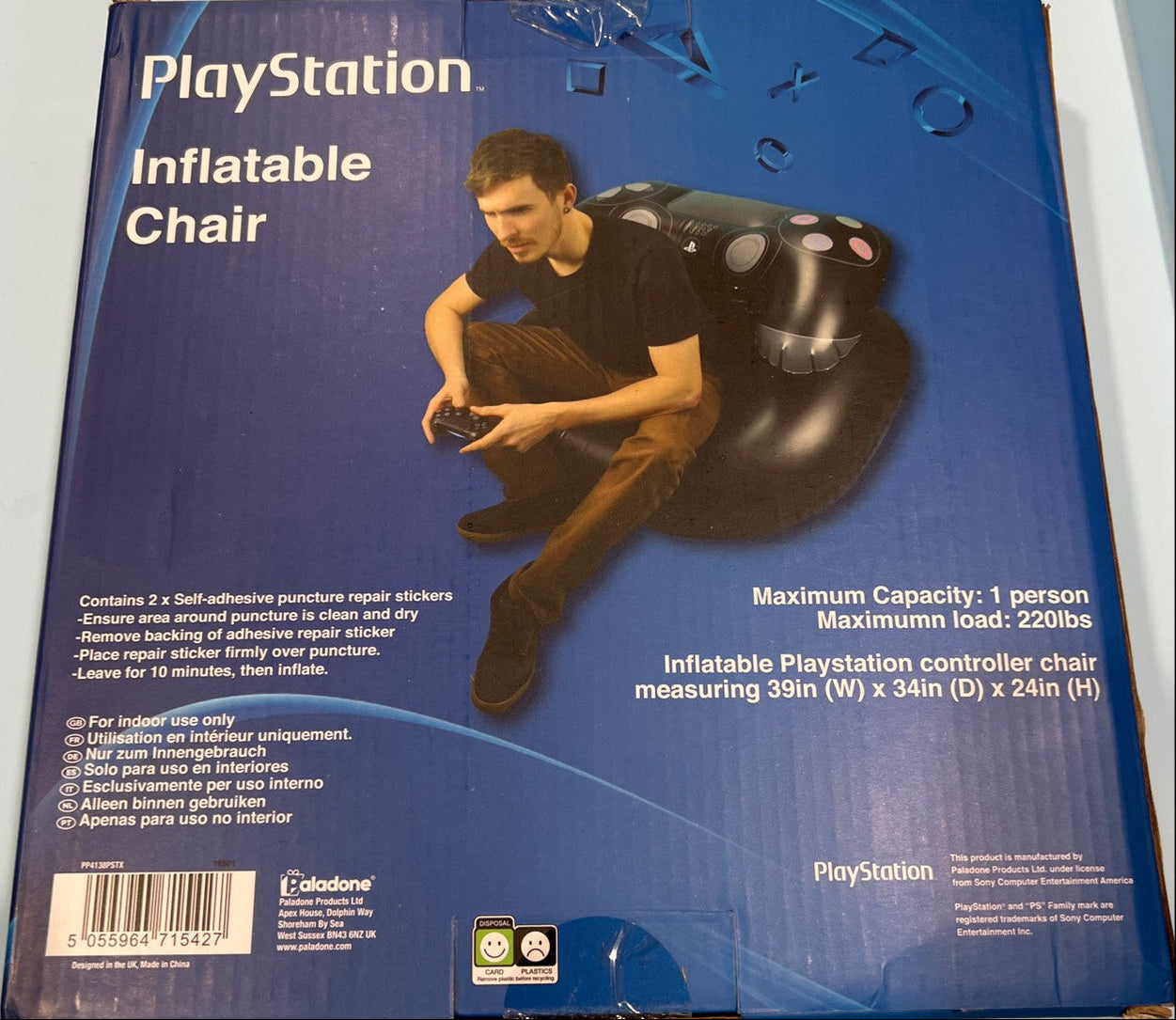 PlayStation inflatable chair packaging with a person