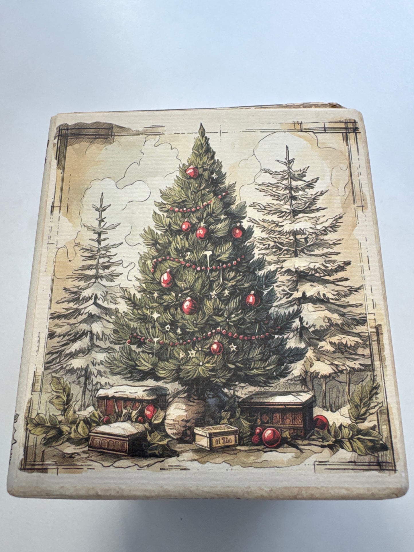 Three-bar soap gift set with vintage-style holiday packaging, tied with red ribbon, scented in vanilla and honey.