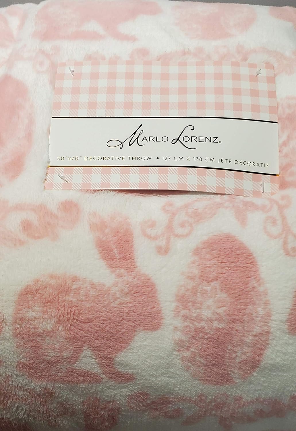 Soft pink and white plush throw blanket with bunny and Easter egg scroll design, 50" x 70", Marlo Lorenz.