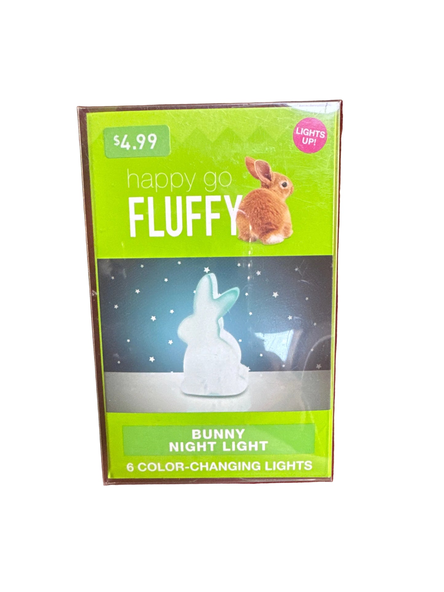 Fluffy Bunny Night Light packaging on a red couch