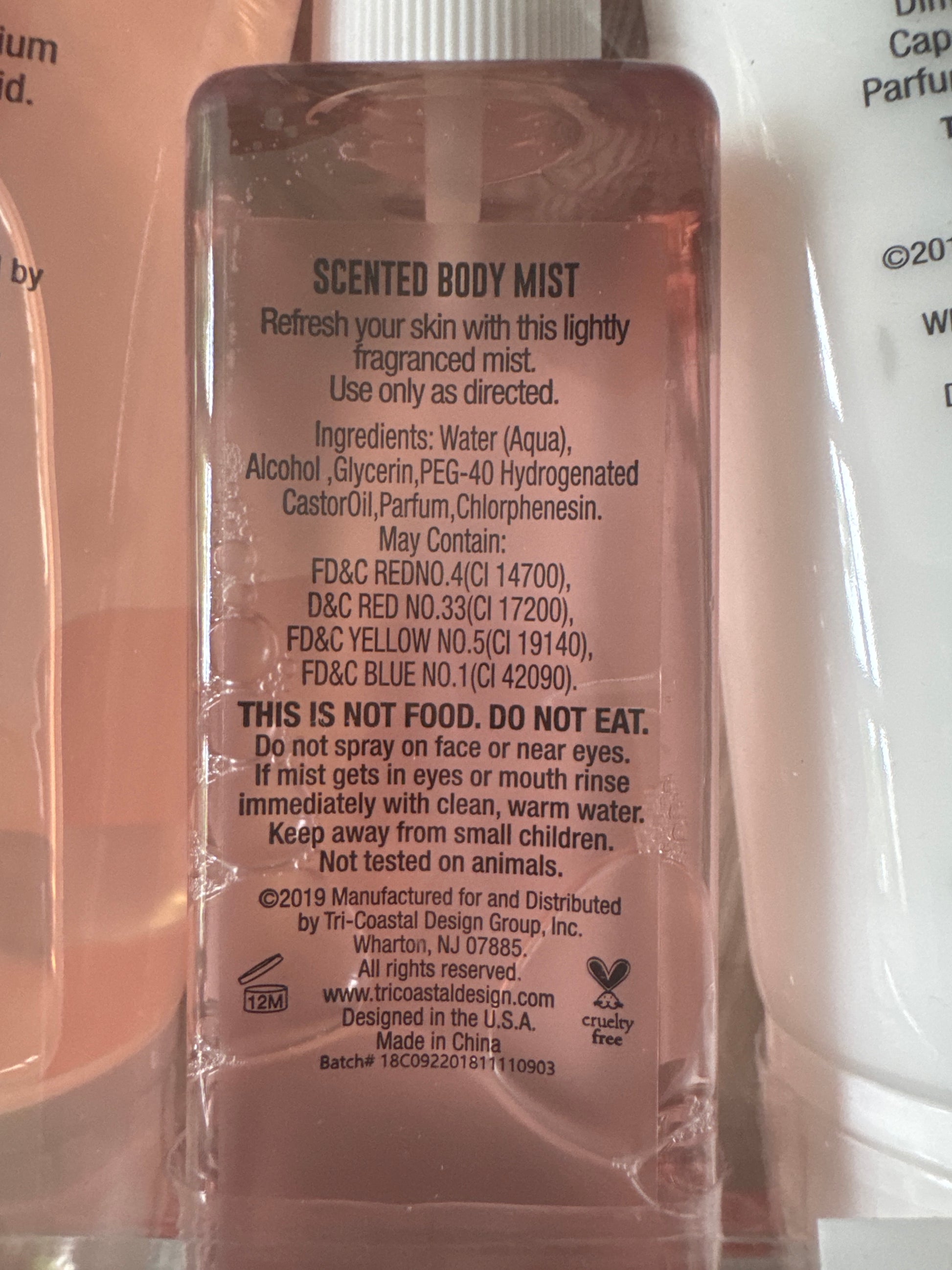 Simple Pleasures full-size mango peach body care set with lotion, mist, and shower gel in pink zip pouch