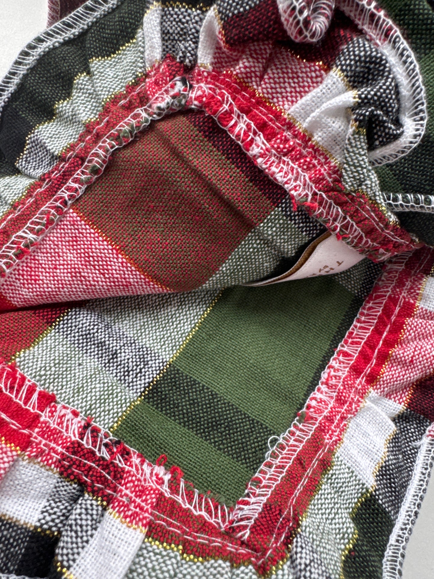 Plaid ruffle border cotton napkins set of six with red, green, and neutral tones, farmhouse-style table linens by The Farmhouse by Rachel Ashwell