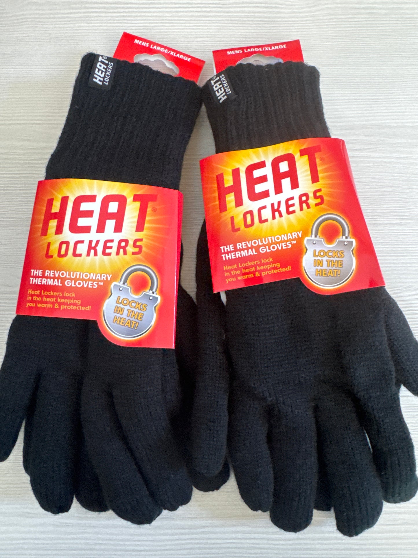Men’s Heat Lockers thermal gloves in black, set of two pairs with red and yellow packaging, designed for extreme winter warmth