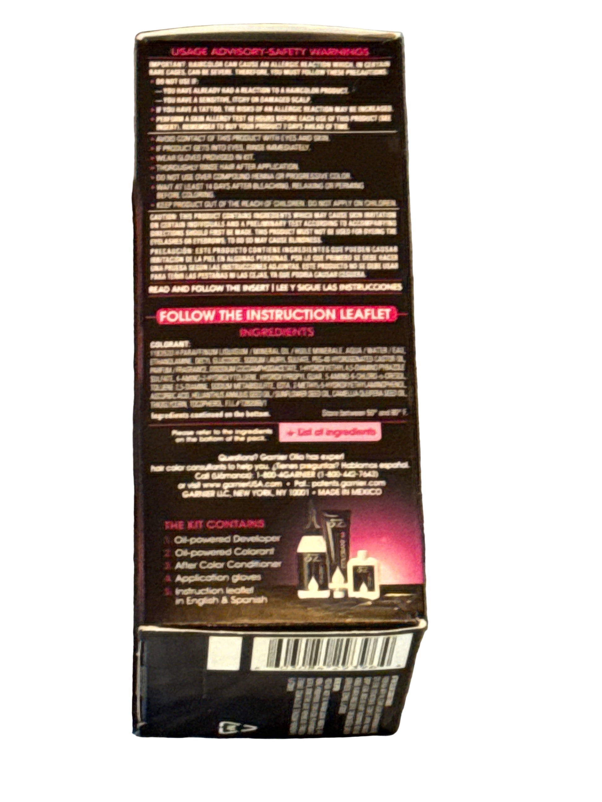 Front of Garnier Olia hair color box showing shade 4.60 Dark Intense Auburn
Back of hair color box displaying instructions and product information
Side panel of hair color packaging with shade details
Hair color box laid flat showing oil-powered color branding
