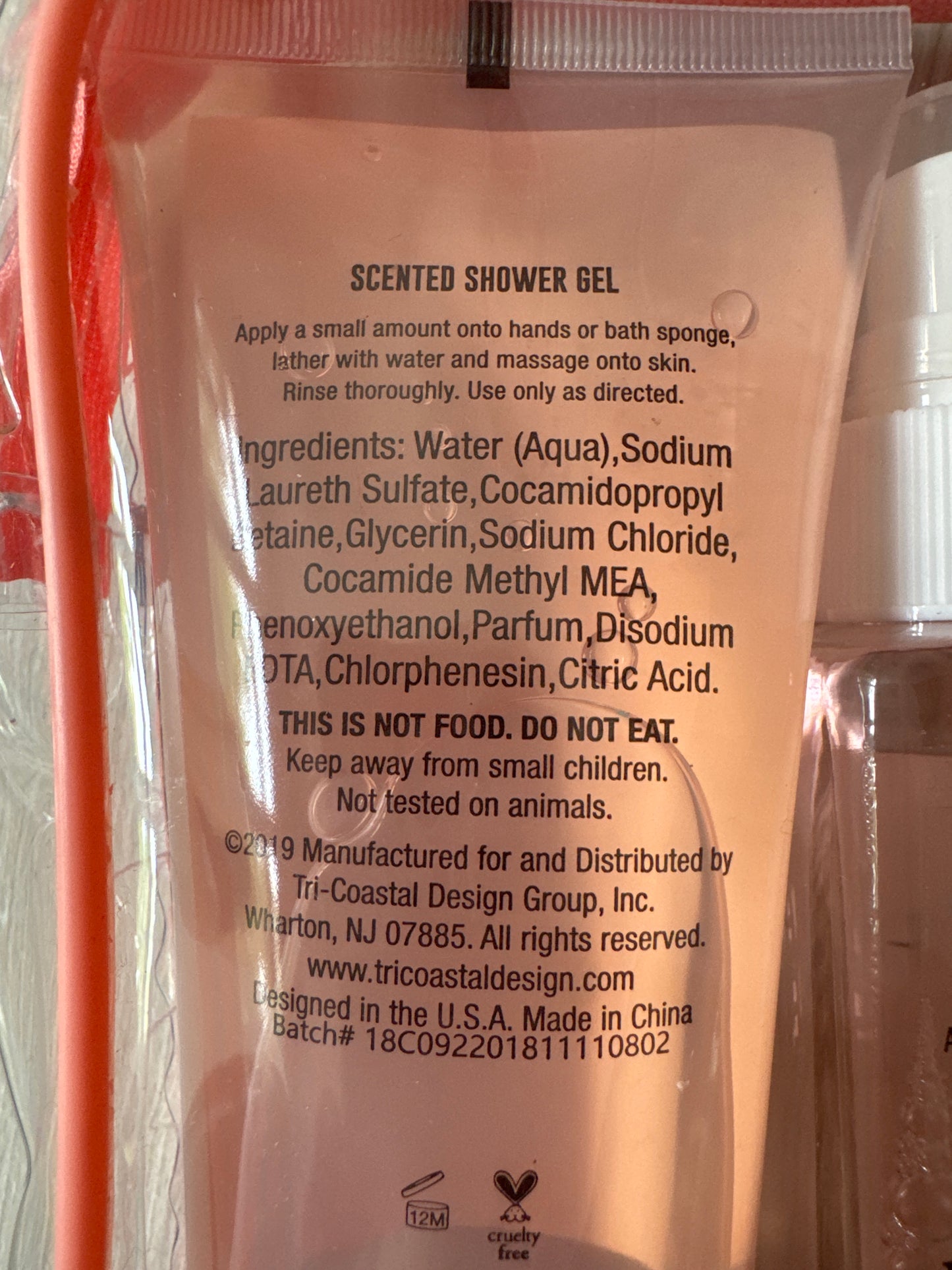 Simple Pleasures full-size mango peach body care set with lotion, mist, and shower gel in pink zip pouch