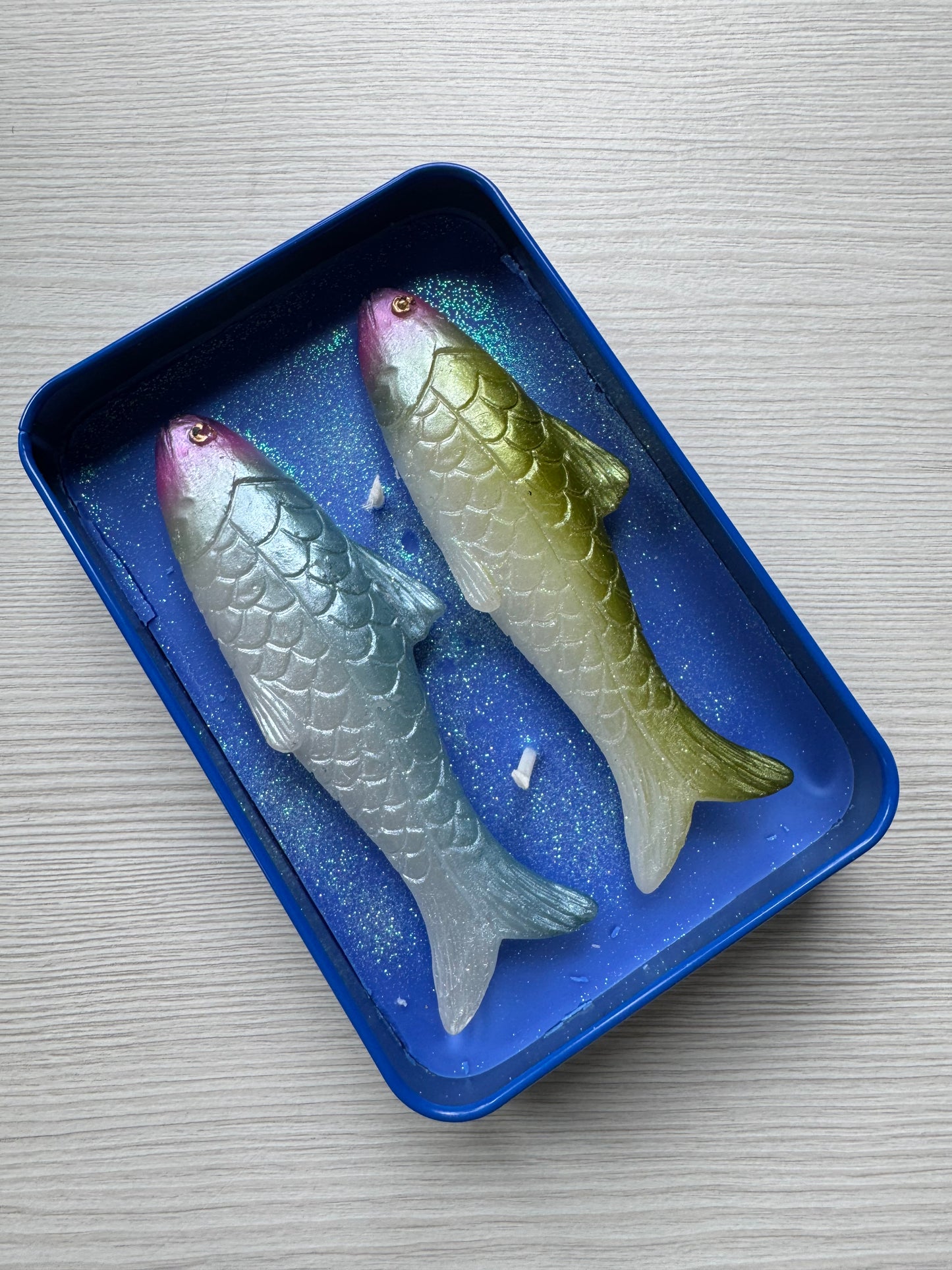 Coastal sardine tin with two colorful fish-shaped Mediterranean olive oil scented candles