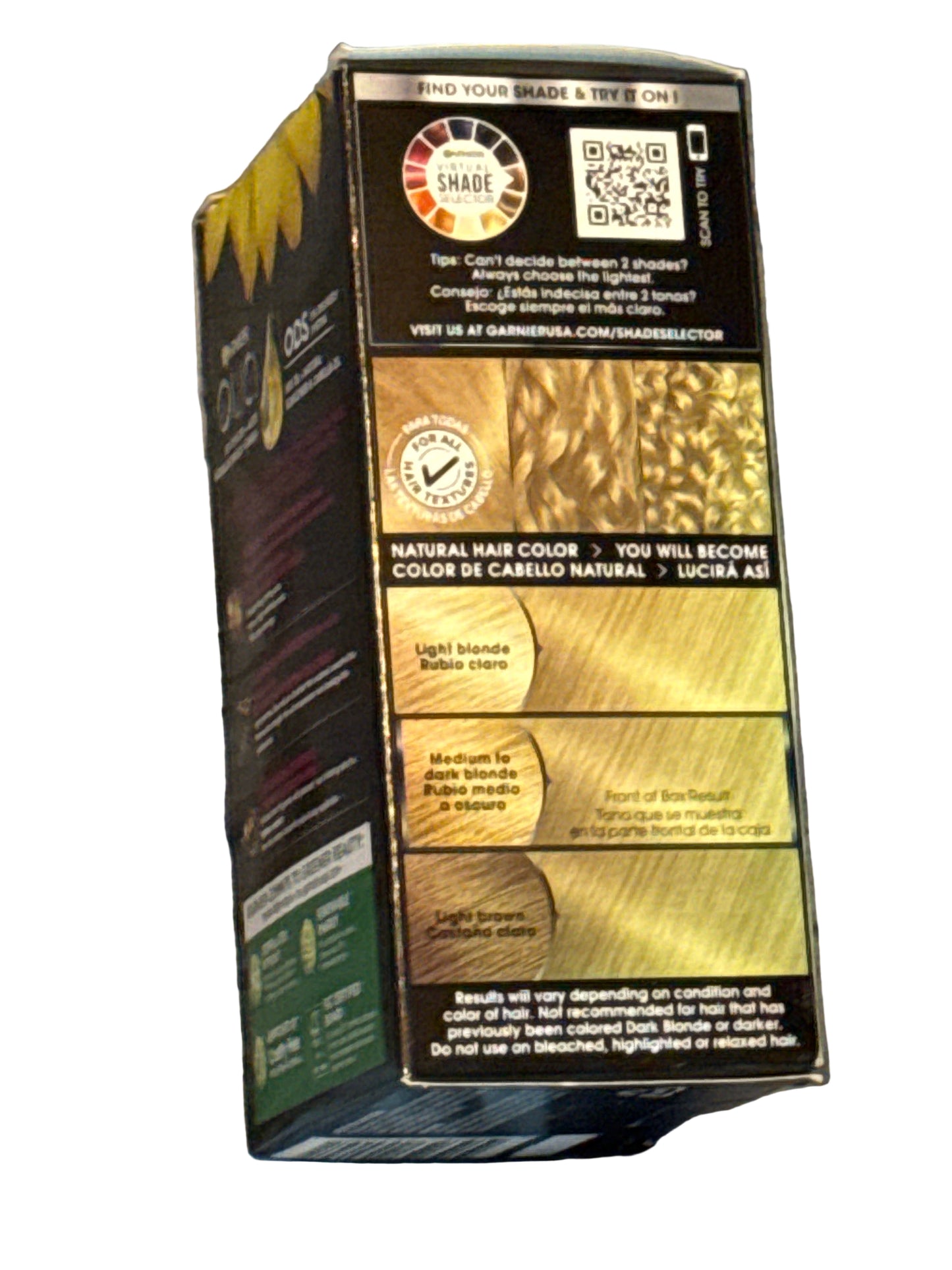 Front of Garnier Olia hair color box showing shade 8.0 Medium Blonde
Back of hair color box with instructions and ingredient information
Side view of Garnier Olia packaging displaying oil-powered color branding