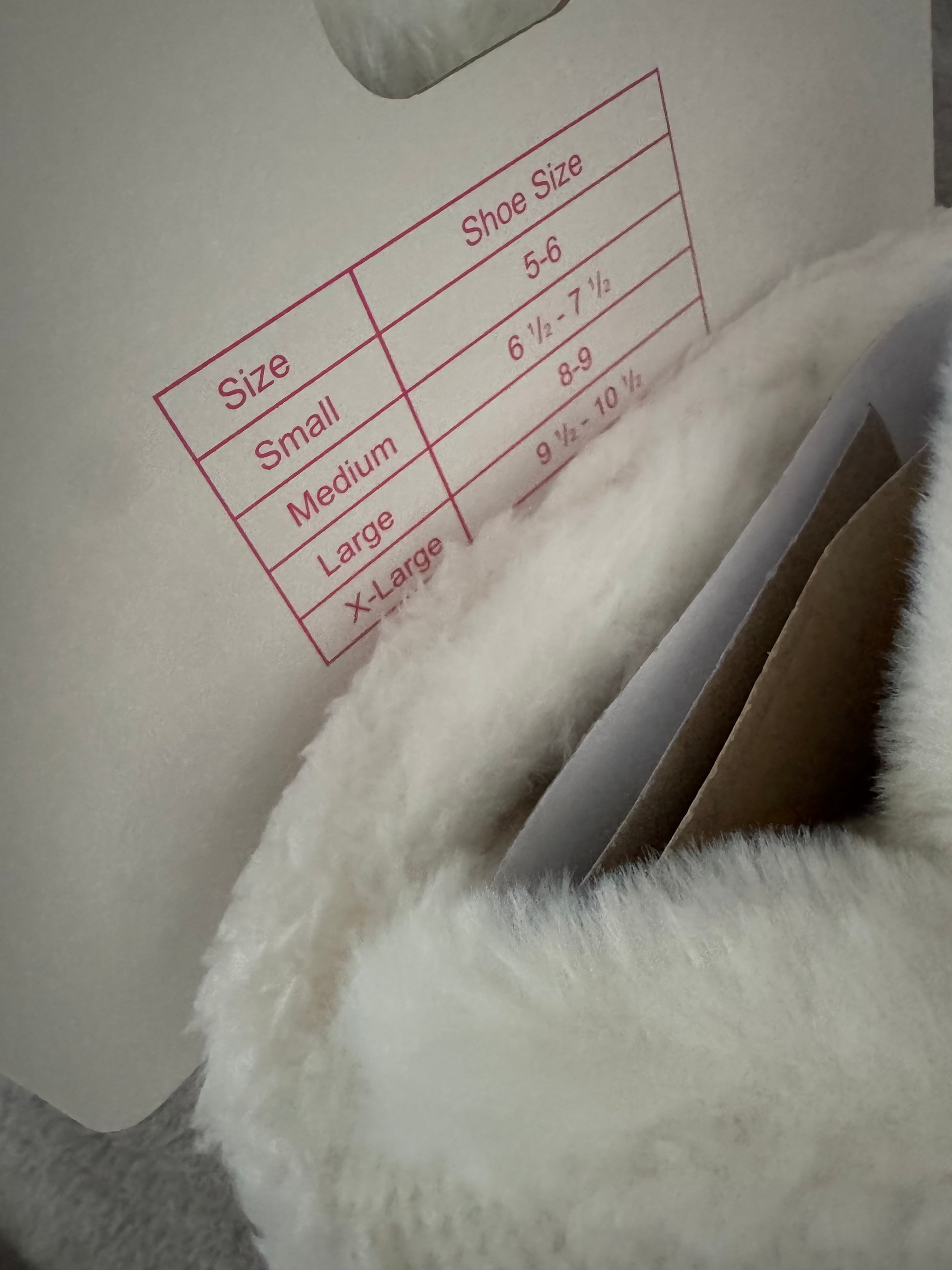 White plush bootie slippers with pom-poms in women’s XL (fits 9.5–10.5)