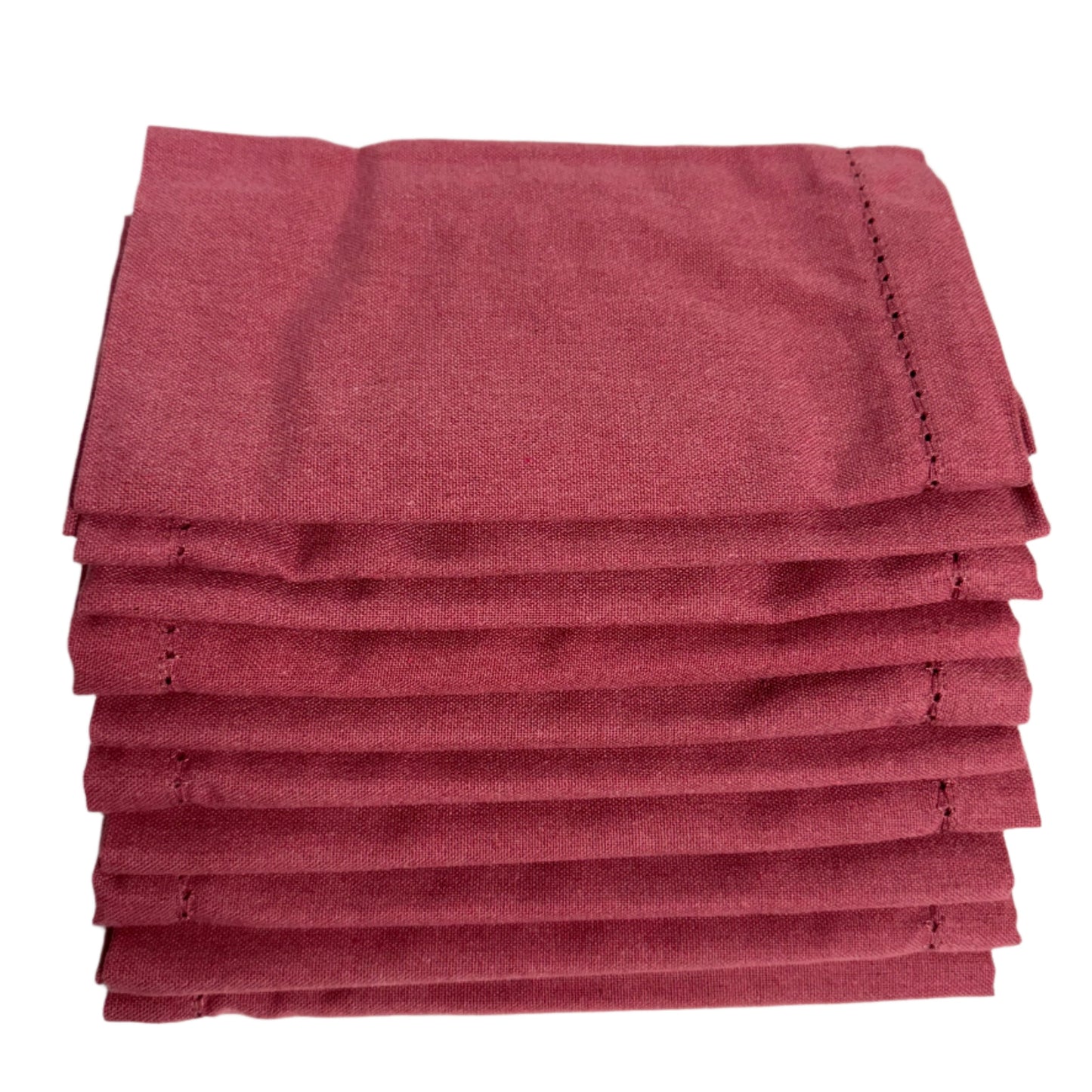 Stack of folded burgundy cotton napkins, neatly arranged with a fine stitched edge, showcasing a polished and clean appearance
