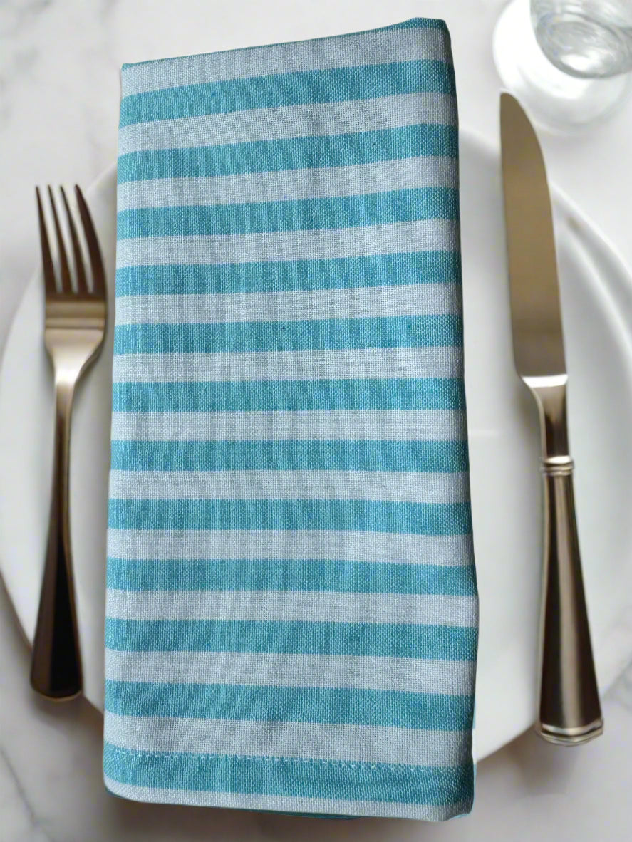 Set of 8 cotton cloth napkins in ocean mist blue and white stripe pattern measuring 18 x 18 inches by Monarch Linens