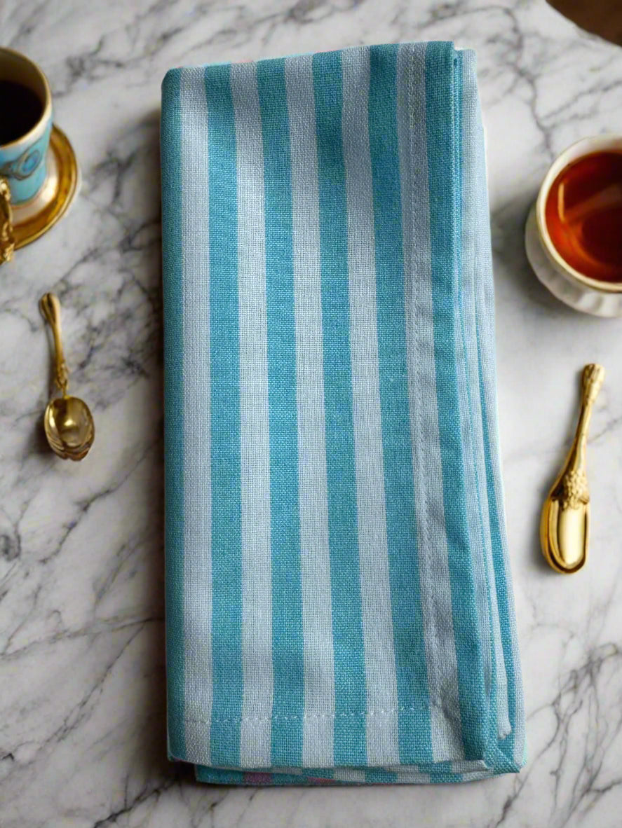 Set of 8 cotton cloth napkins in ocean mist blue and white stripe pattern measuring 18 x 18 inches by Monarch Linens