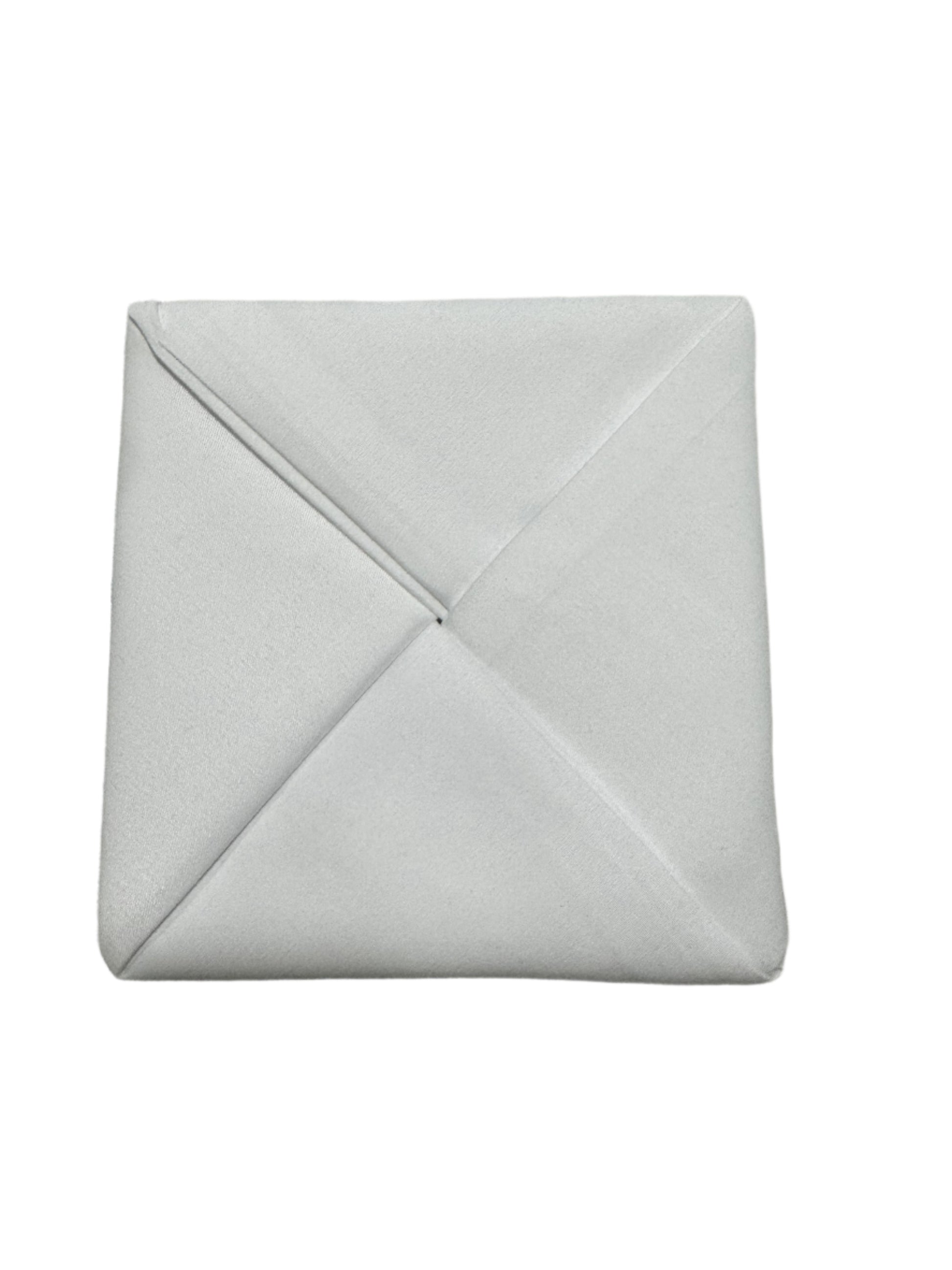 White polyester cloth napkins 18 x 18 inches set of eight by Monarch Linens shown folded and styled for formal and everyday table settings