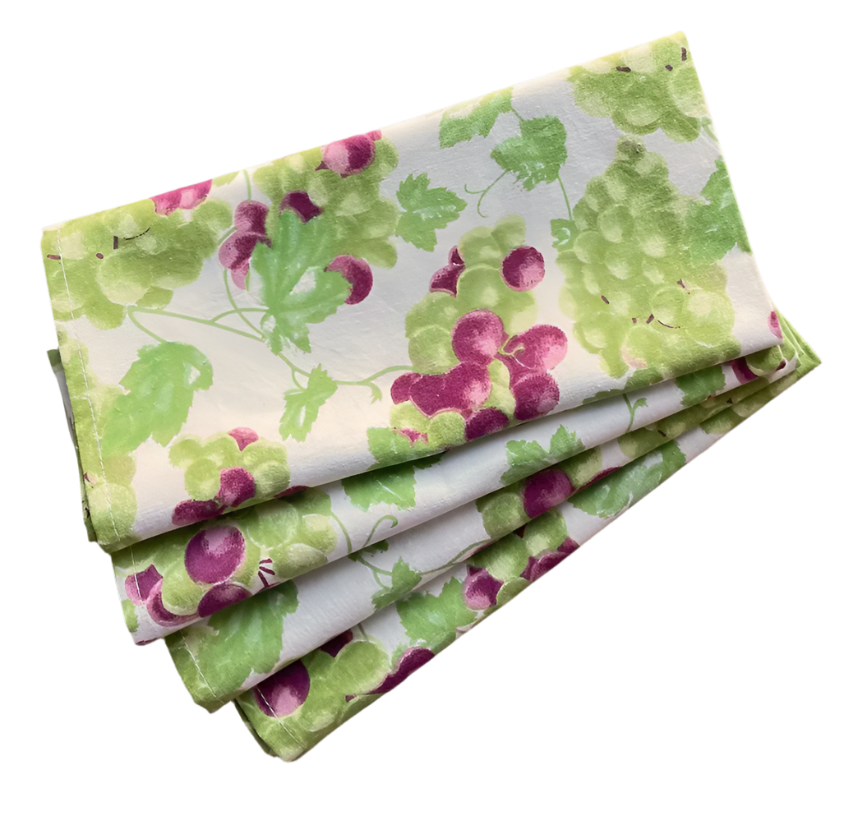 Set of 4 fabric napkins with a vibrant grape design in green and purple, perfect for adding a fresh and elegant touch to your dining table