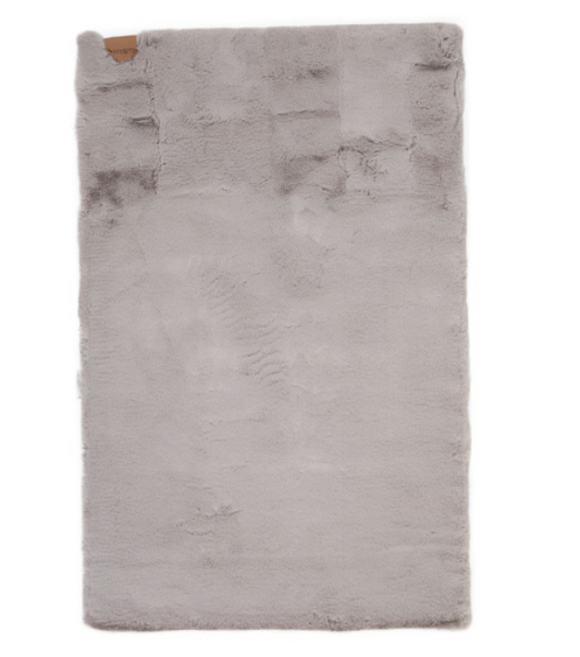 Faux fur Baxter accent rug in light neutral color 27 by 44 inches by Koolaburra by UGG