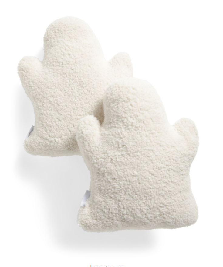 Pair of cream-colored mittens on a white background
