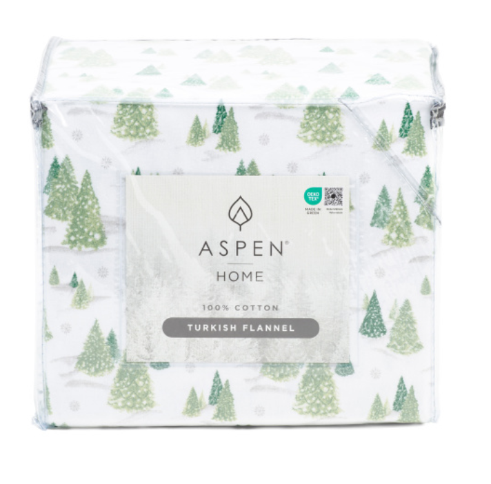 Packaged fabric with tree pattern and Aspen Home branding on a white background