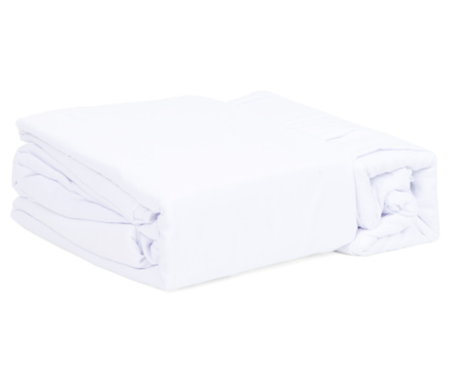 Stack of white folded towels on a white background