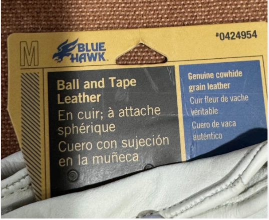 Blue Hawk leather label on a product with text in multiple languages.