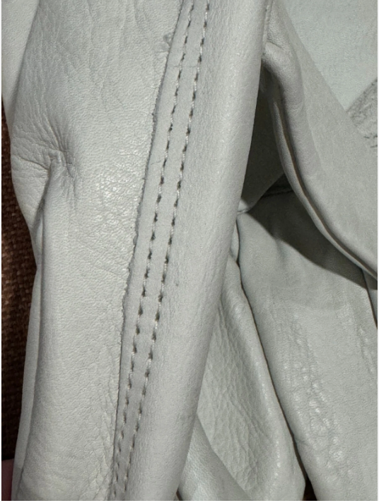 Close-up of leather material with stitching