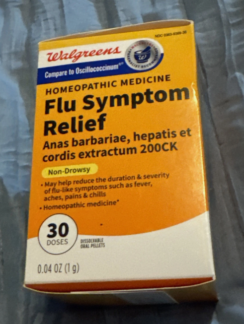 Walgreens Flu Symptom Relief package on a gray background