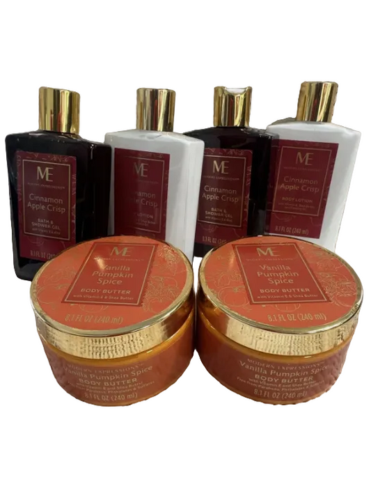 Two jars of body butter with bottles in the background on a textured white surface