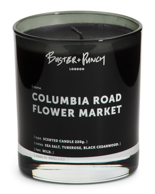 Buster + Punch Columbia Road Flower Market candle in reusable black glass vessel, scented with sea salt, tuberose, and cedarwood, 40-hour burn time