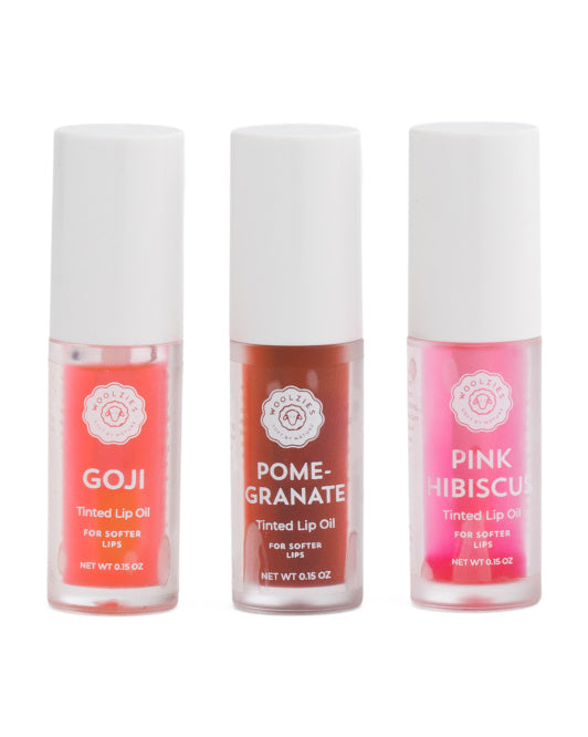 Set of three tinted lip oils in assorted colors and flavors