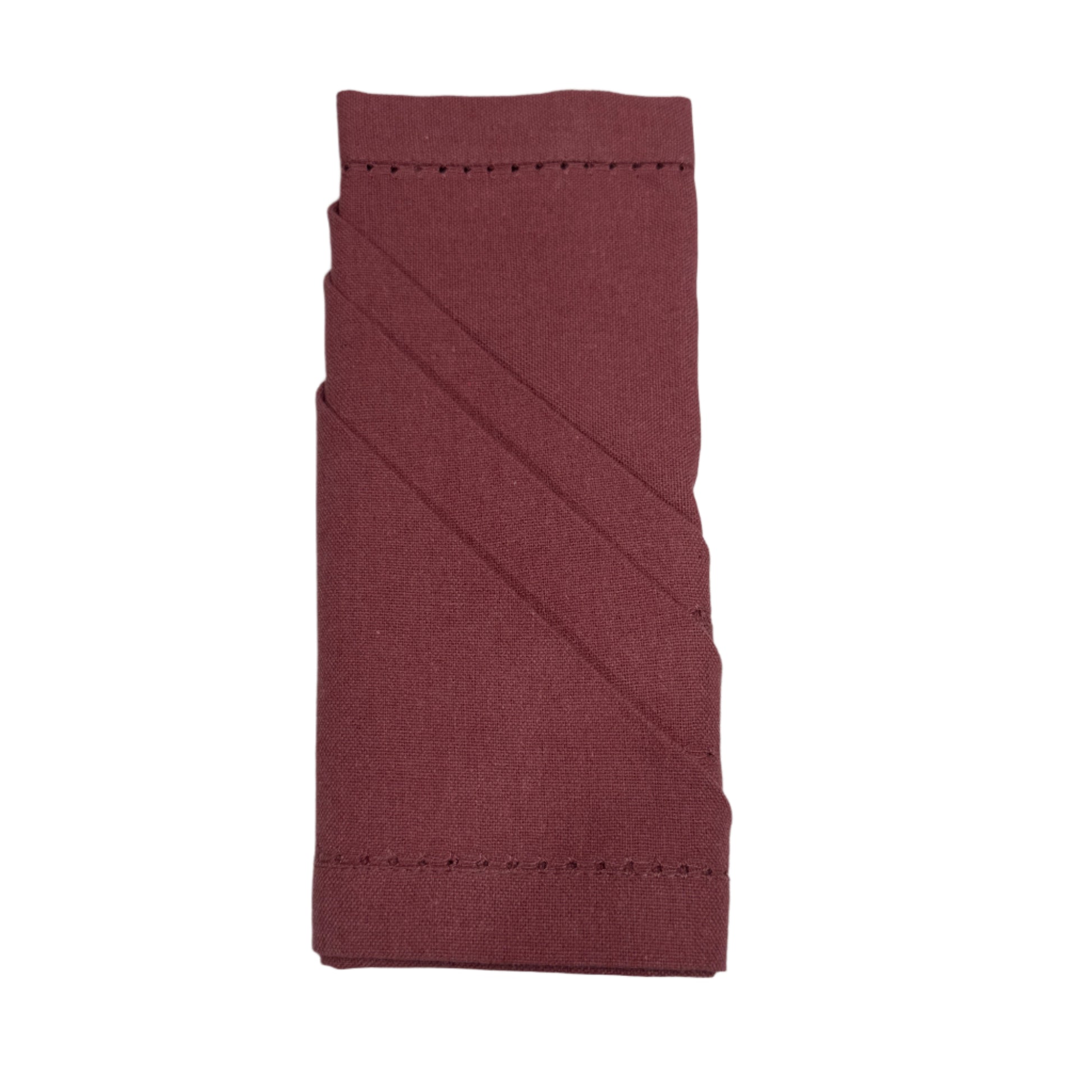 A neatly folded burgundy cotton napkin with diagonal pleats and hemstitching along the edges. The elegant folding showcases the fabric's fine texture and craftsmanship, making it suitable for a refined table setting