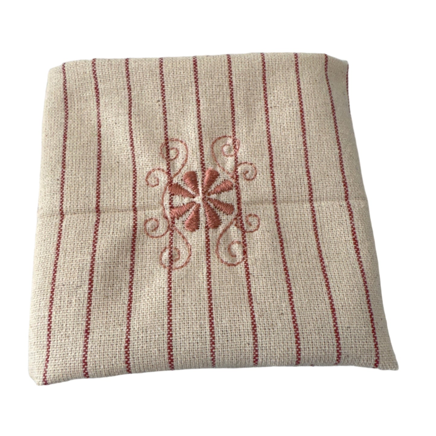 Unbleached cotton cloth napkin with delicate red embroidered floral motif and fine stripe detailing, 12 x 12 inch reusable eco friendly table napkin shown folded on a neutral background