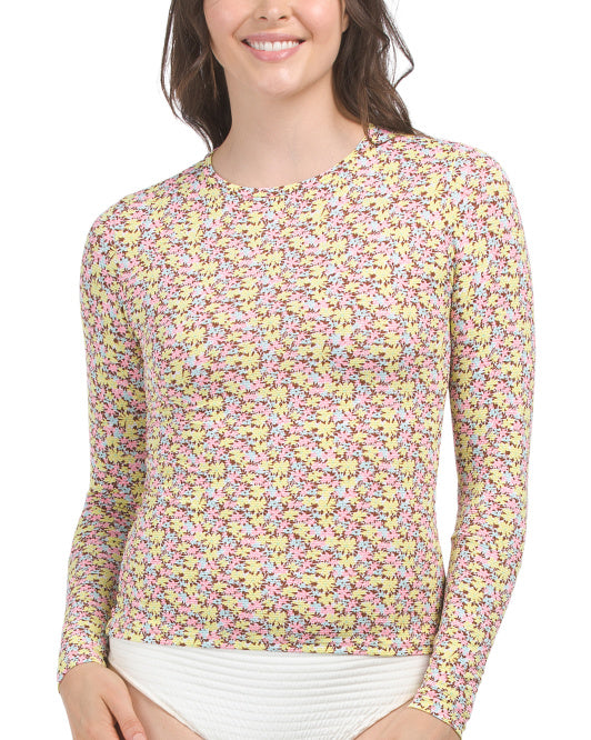 Long sleeve floral rashguard top in pink and yellow print, size Medium
